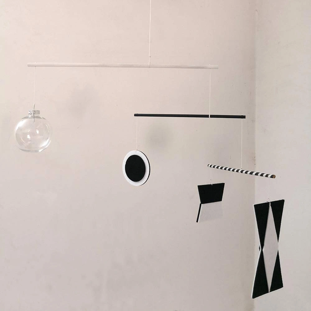 Montessori Munari mobile with black and white geometric shapes and a clear ball